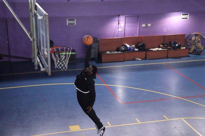 Player driving to the basket for a layup