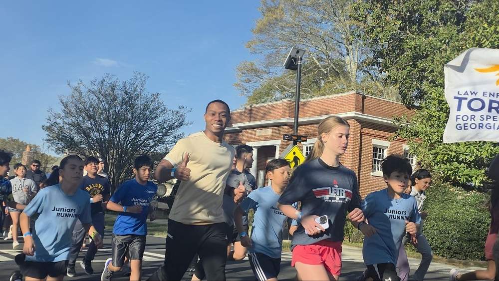 Runners of all ages during a community road race